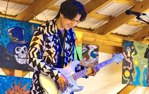 Jeremy playing guitar